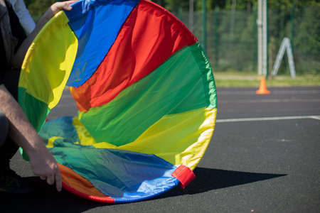 A fabric tunnel for entertainment. Sports rest and sports equipment. An obstacle to missing. Rainbow Tunnel.の写真素材
