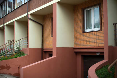 Residential building made of brick. Architecture of modern housing. Multi-storey house for residents.の写真素材