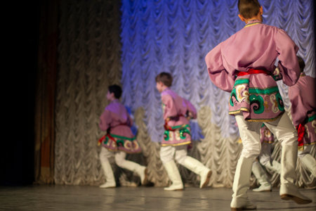 They dance in folk costumes. Russian children dance in sarafans. Performance of the dance group....