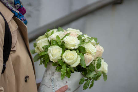 Bouquet of white roses. The bride's bouquet. White roses cut short and gathered together.の写真素材