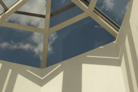 Glazed roof. Modern architecture of the roof of the building. Transparent dome in the shopping center.の写真素材