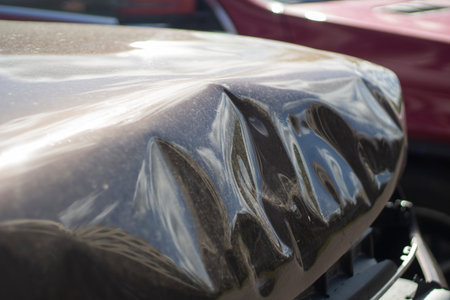 Crutty car hood. Crured iron transport. Car after the accident.