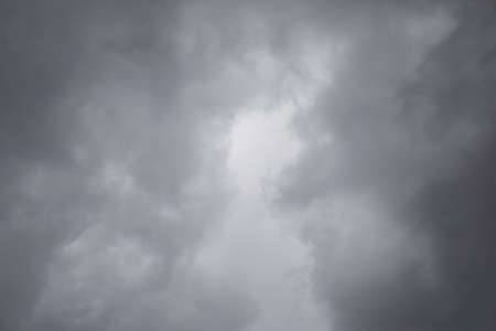Gray sky. Cold weather. Clouds covered the sky. Weather changes. Cooling in Europe.の写真素材