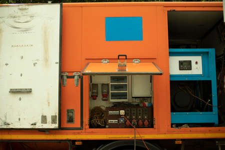 Special machine for servicing gas networks. Specialized transport with gas metering equipment. The work car is orange.の写真素材