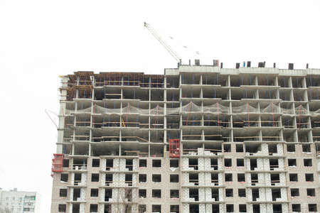 Construction of the building. Concrete base for a multi-storey building. Real estate market in the city.の写真素材
