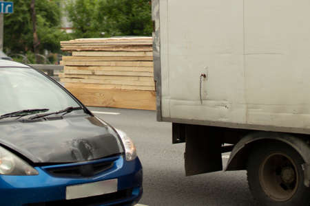 Car on the road. The car is on the street. Transport in the summer. Highway for the movement of cars.の写真素材