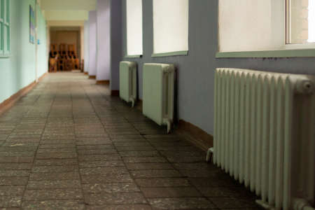 School corridor in Russia. The school building from the inside. Place of training of schoolchildren. An empty corridor in an educational institution.の写真素材