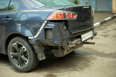 A car without a bumper. Damaged part of the transport. Car after the accident. Car repair details.の写真素材