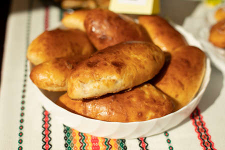 Homemade cakes. Pies with filling. Fried food. Sweets from dough. Russian cuisine. Rustic pastries from dough.の写真素材