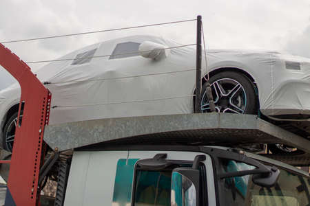 Car on the road. The car is on the street. Transport in the summer. Highway for the movement of cars.の写真素材