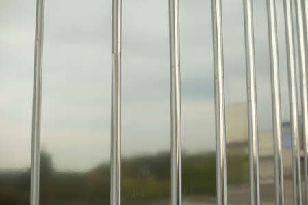 Mirror wall. Rusty surface in the park. Details of the architecture of park objects. Mirror stand for photos.の写真素材