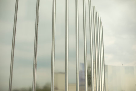 Mirror wall. Rusty surface in the park. Details of the architecture of park objects. Mirror stand for photos.の写真素材