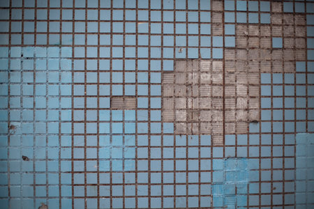 Tile texture. Fine tiles on the wall. Collapsed cladding of the building.の写真素材