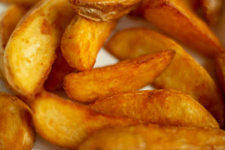 Fried potatoes. Potatoes are rustic. Fatty food. Food from the restaurant.の写真素材