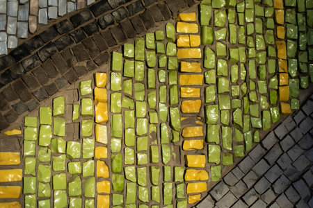 Mosaic texture. Wall is made of pieces of glass. colored stone. architecture details.