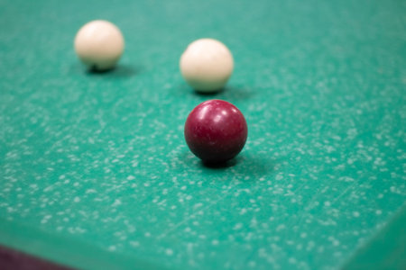 Billiard balls are white. green billiard table. playing in bar. sports competition. Balls rattled...
