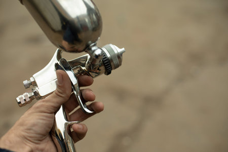 Paint sprayer. Tools for air and liquid paint. Chrome-plated steel. Means of painting.