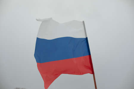 Flag of Russia. Symbol of Russian Federation. Combination of white blue and red. fabric in colors of state.の写真素材