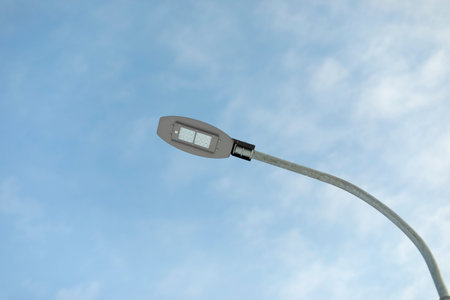 LED lighting on street. equipment in the park. lighting fixture. Light source against sky.