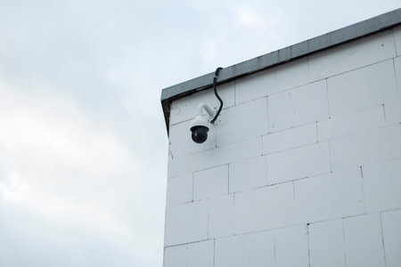 Video camera on corner of building. video surveillance system. security camera. Equipment for...
