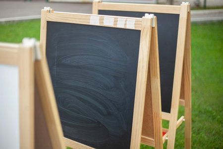 drawing board. Malberts for chalk. Black space for inscription. Wooden stand for artist's work....