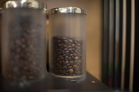 coffee machine. Coffee beans loaded into coffee maker. Preparation of strong drink. Coffee Machine...