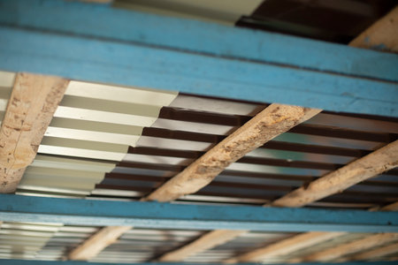 Roof from inside. Ceiling details. Chipped roof. Detail Architecture.の写真素材