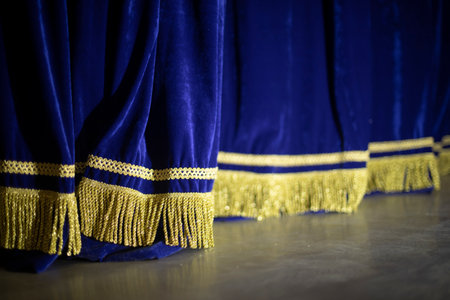 Blue Curtain. Curtain on stage. blue fabric. Details of theater.の写真素材