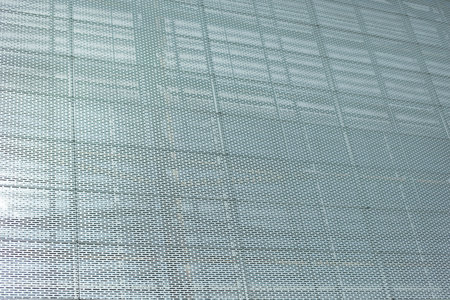 Steel wall of building. Grill on wall. office building. texture architecture.の写真素材