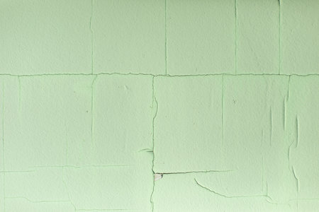 cracked paint. green background. Texture in cracks. Wall details.の写真素材