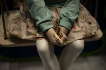 Mannequin in dress. Children's mannequin in clothing store. plastic hands. fashion details.の写真素材
