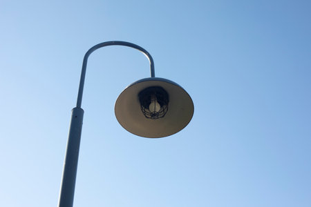 Field with lamp. street light. Lamp against sky. Details of urban infrastructure. light in park.の写真素材