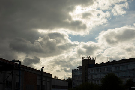 sky over city. Clouds and buildings. landscape in summer. contrast image.の写真素材