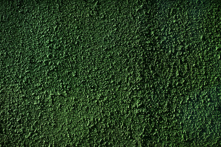 green rough wall. painted surface. Rough texture. Finishing of putties.の写真素材