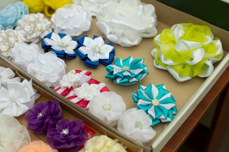 fabric bows. Handmade hair clips. Flowers from fabric flaps. hair ornament. Details of fair.