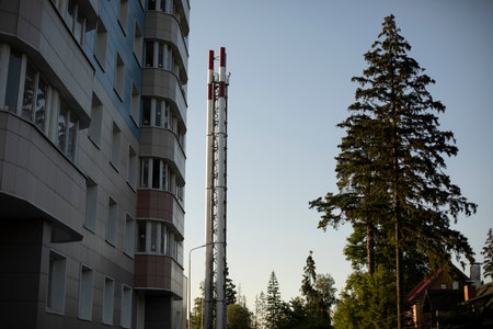house and pipe. Boiler room near residential building. steam pipe. building details.の写真素材