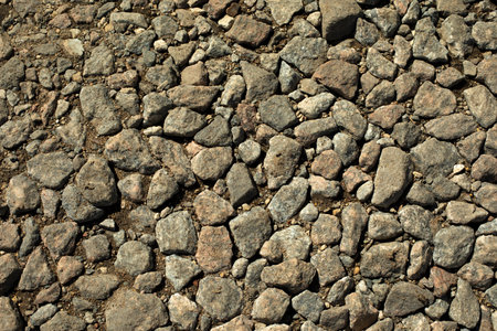 texture of stones. Rocks on road. Background of small parts. Details of nature. Stone covering.の写真素材