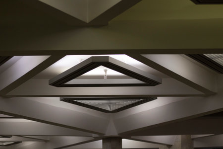 interior light. Lamp is triangular. Ceiling details.の写真素材