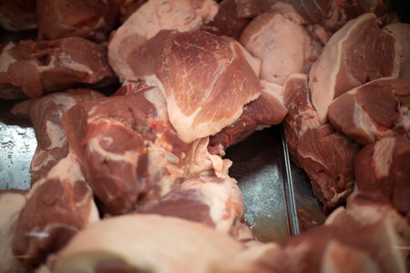 Raw beef meat on tray. cow meat in store. Animal tissue fibers. Details of the rural market.の写真素材