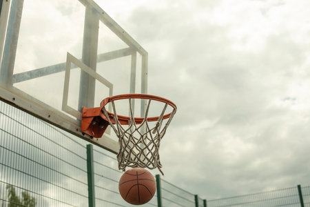 Throwing ball into basket. Accurate hit. Basketball. sports game.の写真素材