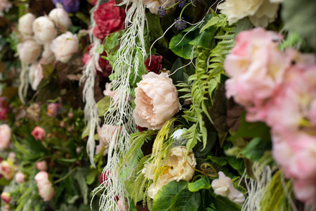 texture flowers. Background of artificial flowers. Wall of inflorescences in detail. Decoration of park.の写真素材