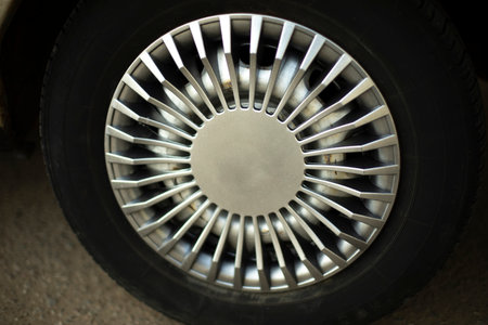 car wheel. hub cap on wheel. Vehicle tuning details. drive wheel. retro style. Black tire.の写真素材