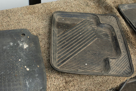 Black car carpet. Foot mat in car. Gray bedding in transport. black pallet.の写真素材