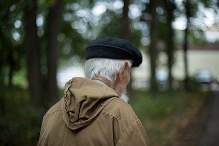 Gray haired elderly man. Russian old man. Retired in Russia. Man walking down street. Ordinary old man.の写真素材