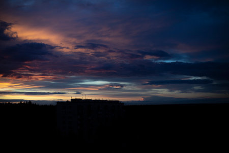 evening sky. purple clouds. Dark sky late in the evening. beautiful scenery.の写真素材