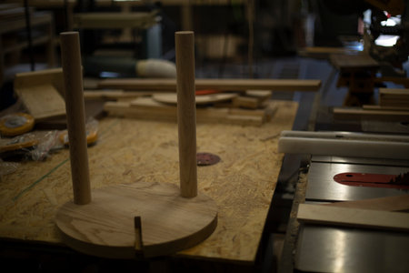 Chair in carpentry workshop. Creation of furniture. production of wood. Table in workshop.の写真素材