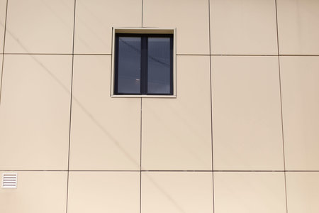 Window in wall of building. architecture details. Facade of house. Minimalism in design.