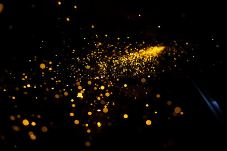 Sparks of yellow color. metal treatment. Lights in dark. Sparks from split grinding disc. Details of work.の写真素材