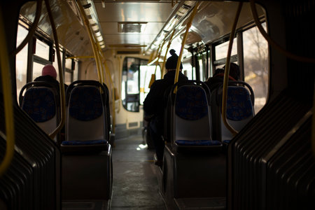 inside bus. People go in transport. Salon of public transport.の写真素材
