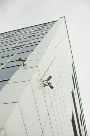 video cameras on building. video surveillance system. Cameras on wall. Perimeter security system.の写真素材